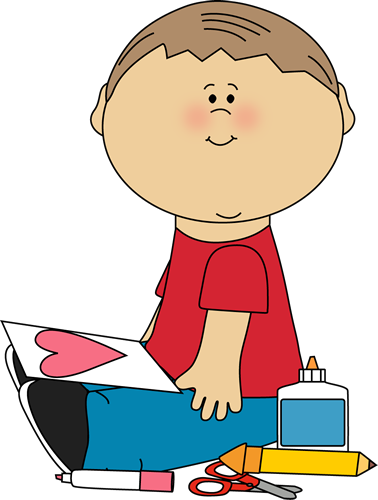 boy drawing valentine picture
